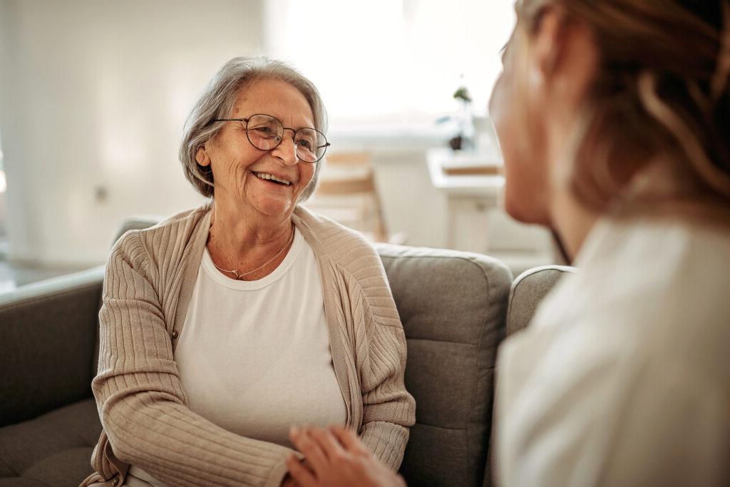 Senior woman speaking with her provider